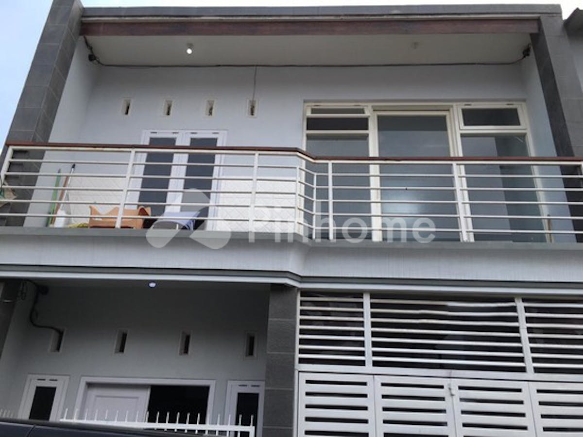 Dijual Rumah Siap Pakai Dekat Fasilitas Umum di Mutiara Garden, Jl. KH. Malik Dalam - Gambar 1