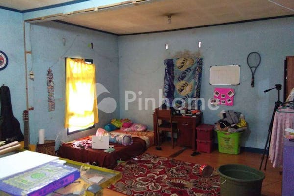 dijual rumah lingkungan nyaman pinggir jalan di jl  nasional - 3