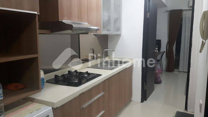 dijual apartemen siap pakai di cosmo mansion  jl  tlk  betung blvd - 1