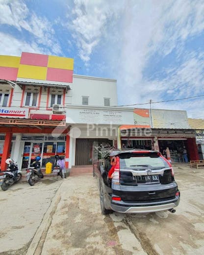 dijual ruko lokasi strategis di perumnas telukjambe  jl  parikesit - 2