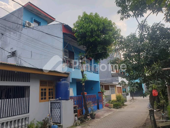 dijual rumah lokasi strategis di dasana indah blok ue 5 no 24 - 2