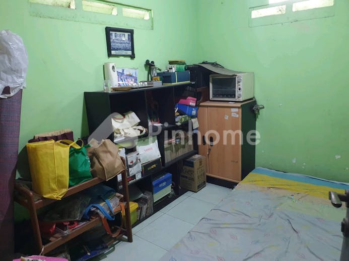 dijual rumah lokasi strategis di dasana indah blok ue 5 no 24 - 5