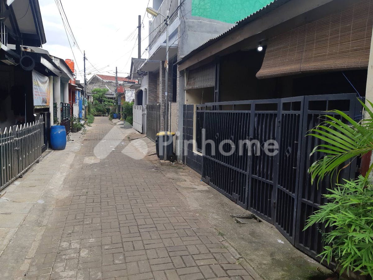 Dijual Rumah Siap Huni di Jl. Besi Raya Perumnas II - Gambar 1