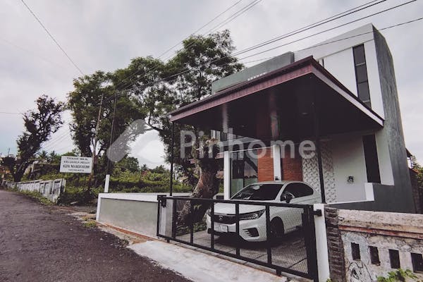 dijual rumah guesthouse 2 lt full furnished di kaliurang km17 pesanggrahan pakembinangun - 4