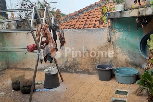 dijual rumah karena ingin pindah di jl jembatan bandung  gang - 9