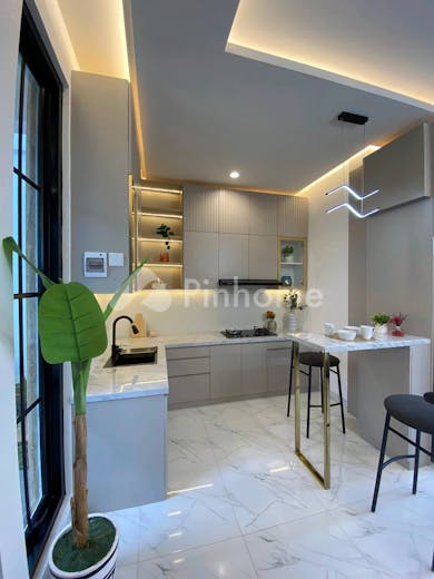 dijual rumah modern full furnished cluster de ghania di jl  purwomukti barat iii - 11