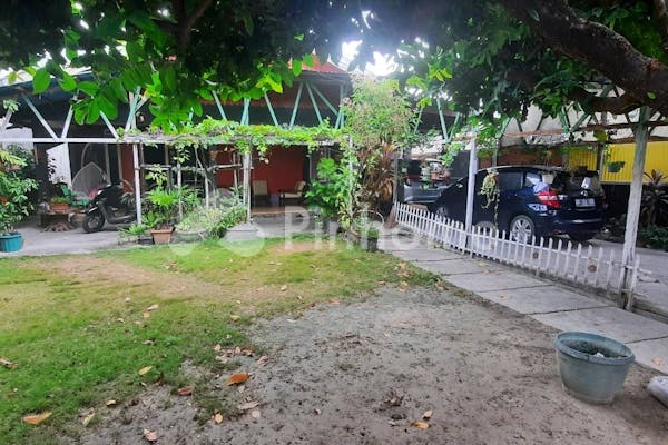 dijual rumah strategis   asri di jl  dr  sutomo no 22 kota palu - 1