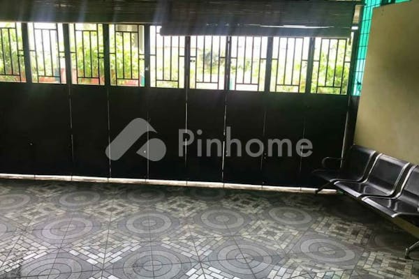 dijual rumah lokasi strategis  bebas banjir di jl alumenium raya  alfaka 7 - 8