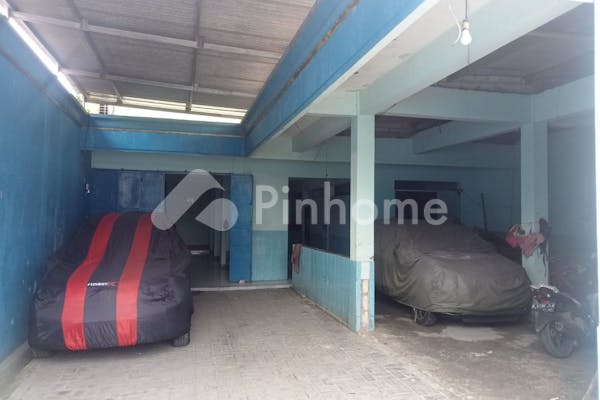 dijual rumah dan usaha depo air minum di jl  raya al barokah - 7