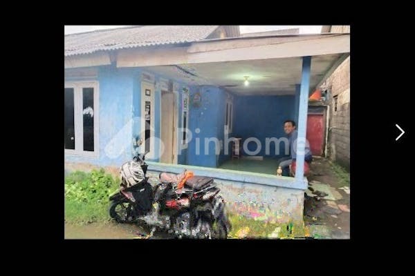 dijual rumah kampung di jalan kapten idrus no 46 rt 002 rw 004 tapos - 1